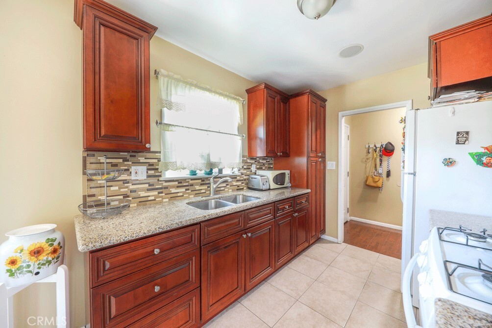 Property Photo:  3568 E 54th Street  CA 90270 
