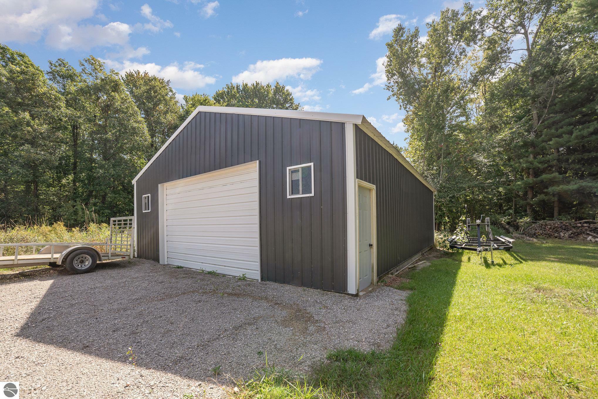 Property Photo:  4575 W Jackson Road  MI 48801 