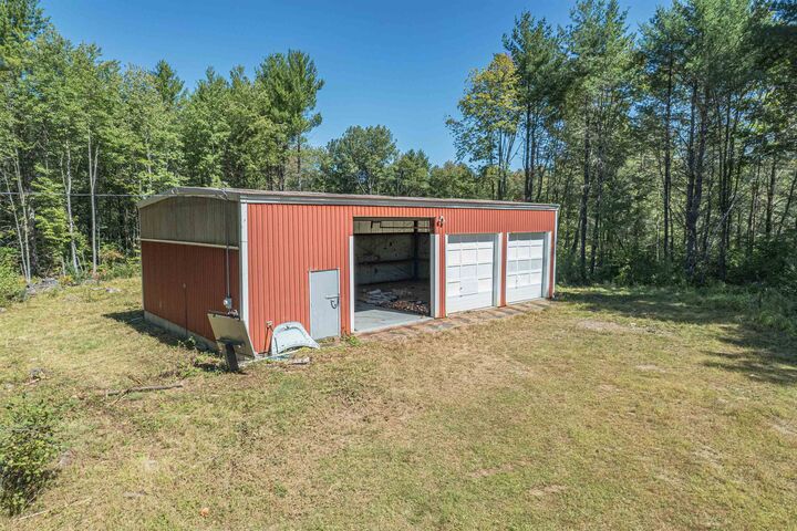 Property Photo:  63 Mammoth Road  NH 03087 