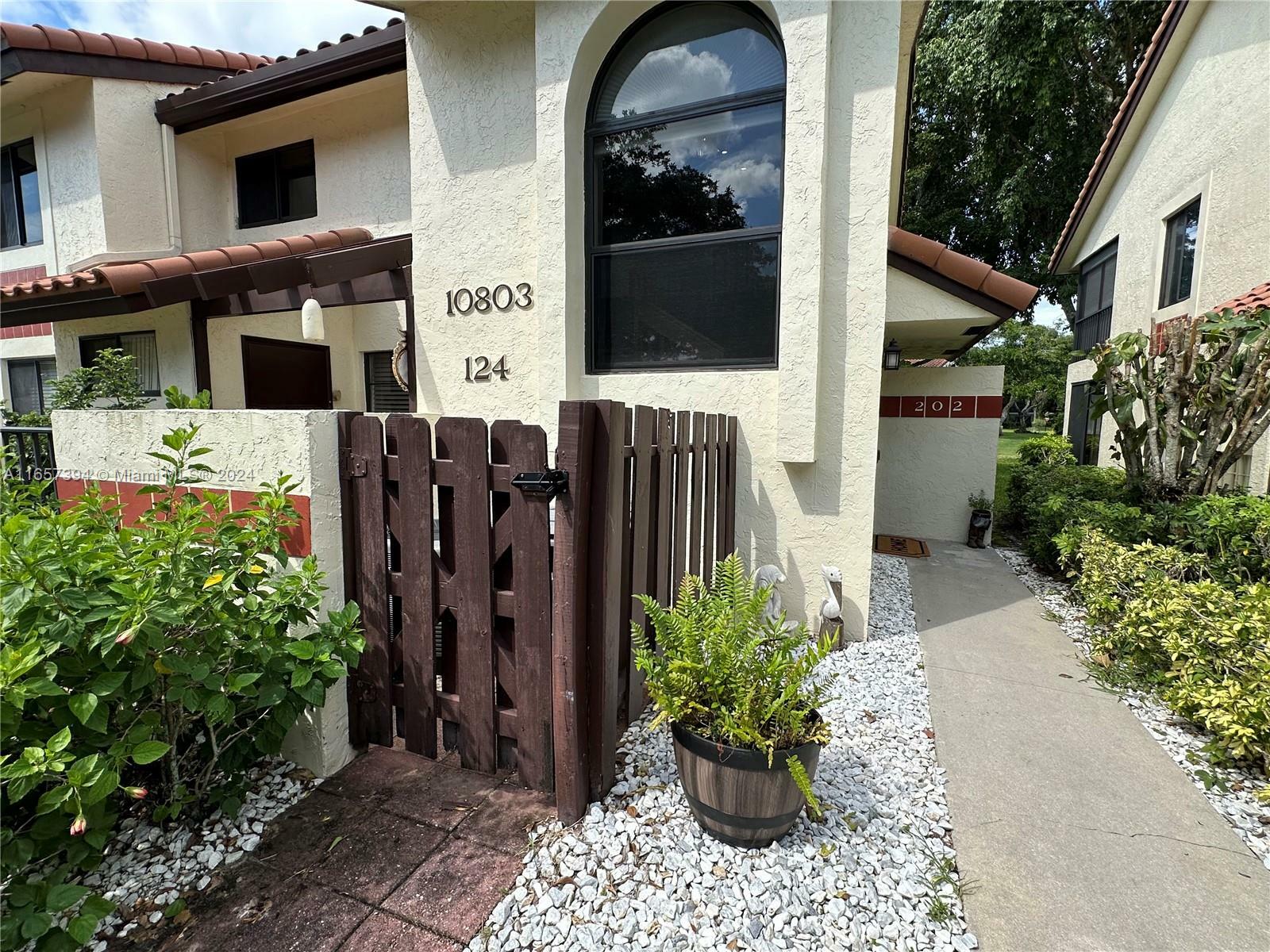 Property Photo:  10803 Palm Lake Ave 202  FL 33437 