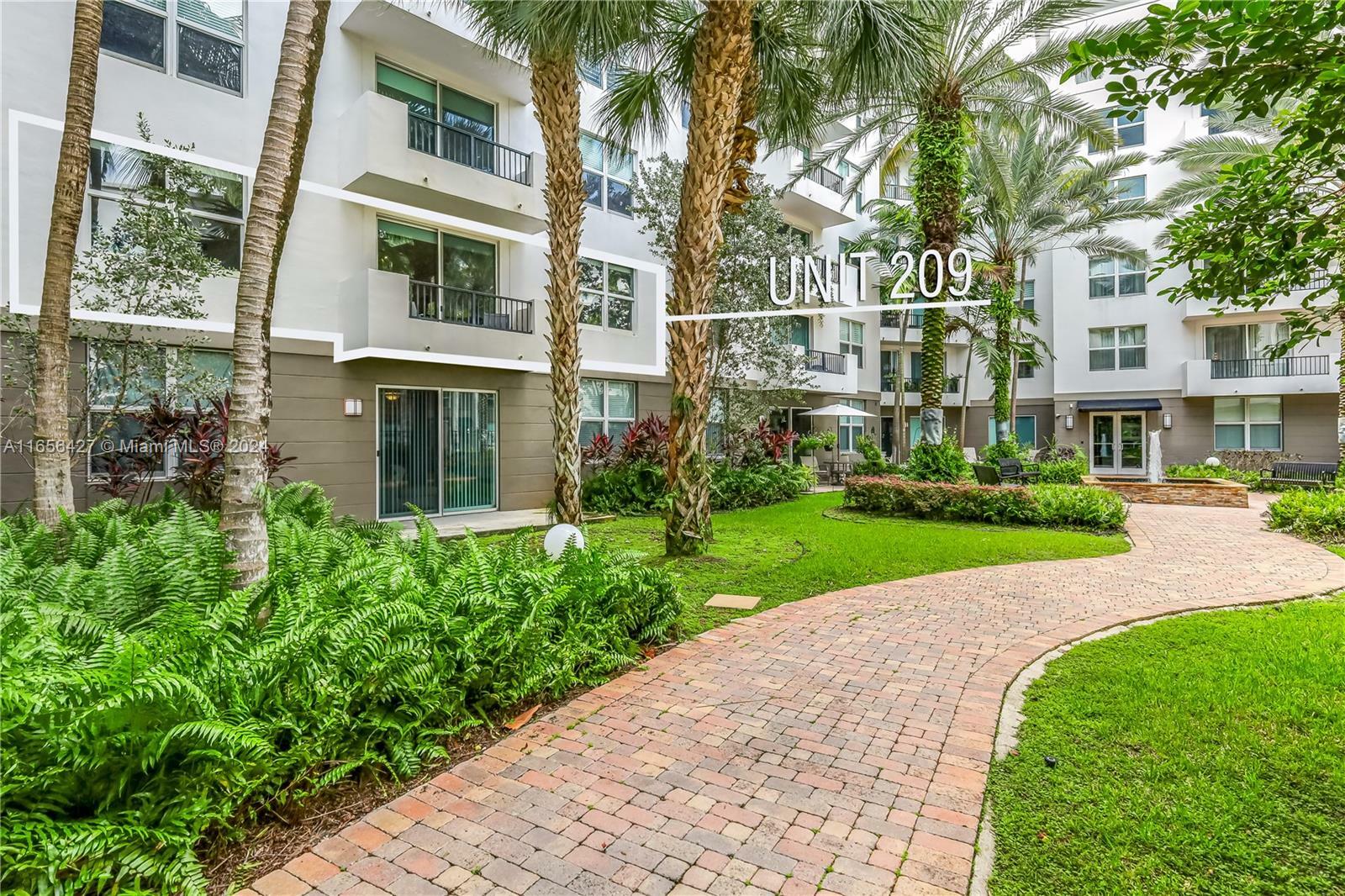 Property Photo:  2421 NE 65th St 209  FL 33308 