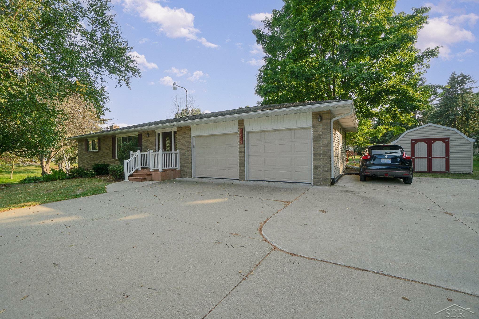 Property Photo:  8675 N River Road  MI 48623 