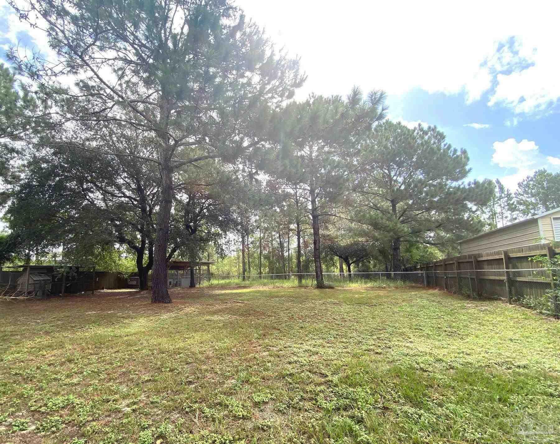 Property Photo:  9387 E River Dr  FL 32566 