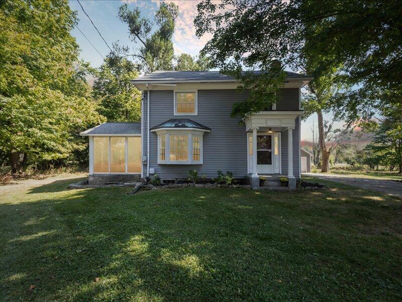 Property Photo:  7635 S Jackson Road  MI 49201 