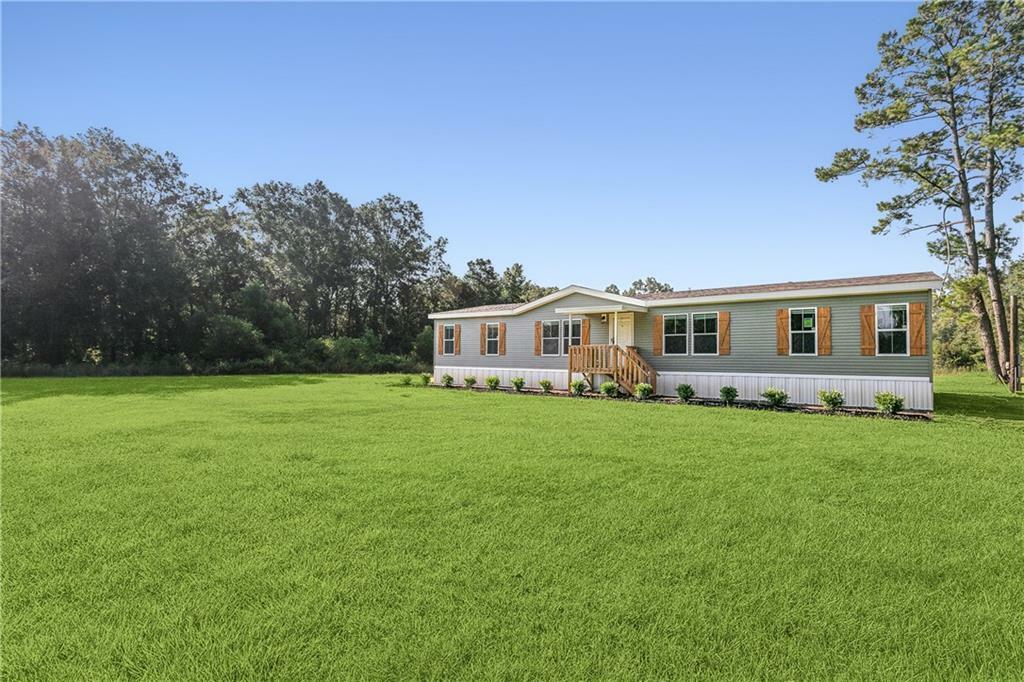 Property Photo:  22136 Tom Perrin Road  LA 70454 