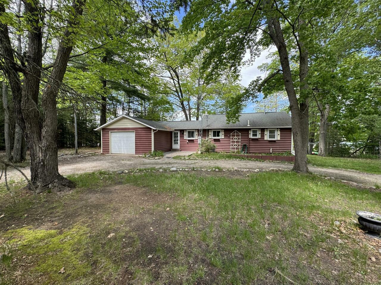 Property Photo:  10930 River Road  MI 49709 