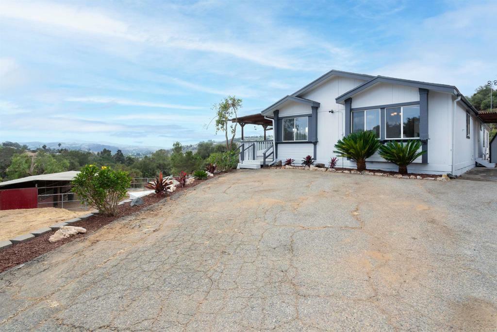 Property Photo:  3862 Las Flores  CA 92028 