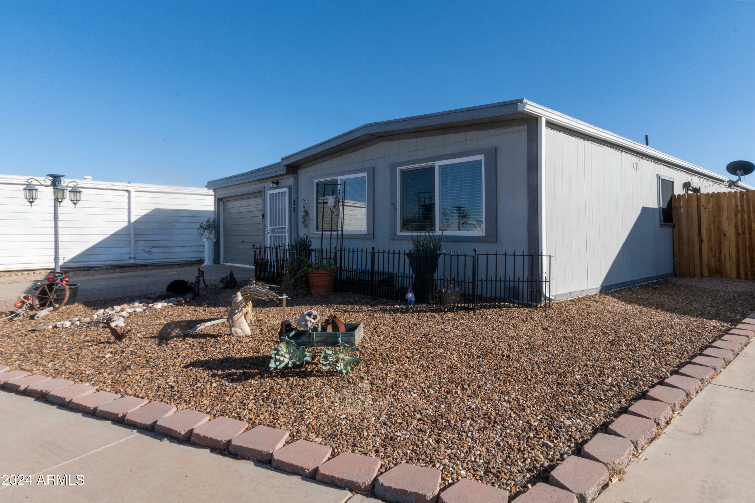 Property Photo:  10201 N 99th Avenue 28A  AZ 85345 