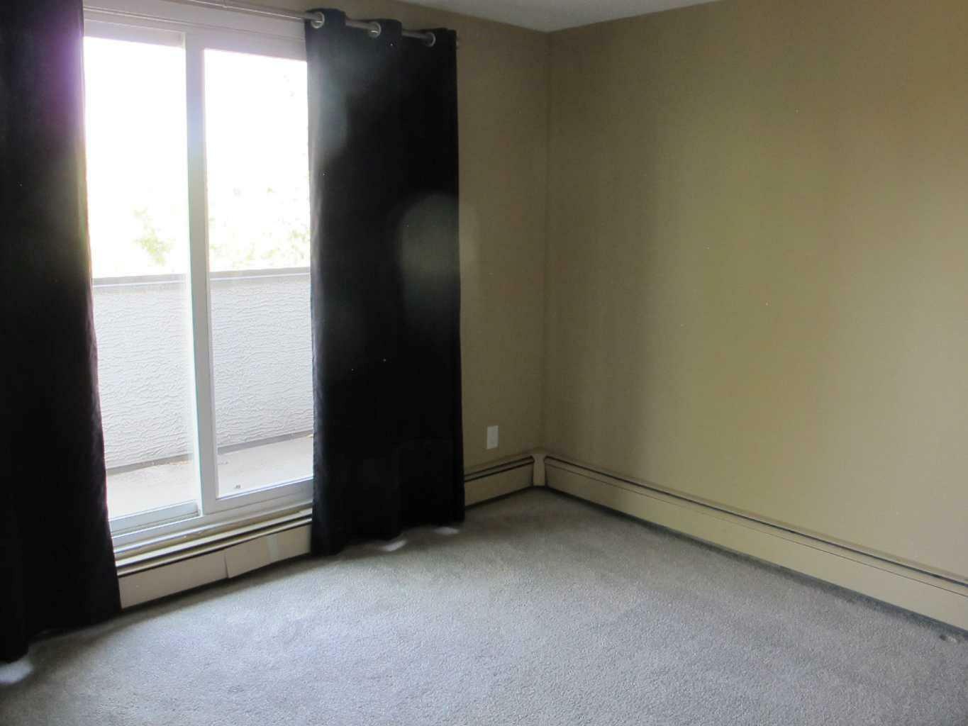 Property Photo:  280 Banister Drive 302  AB T1S 1Y5 