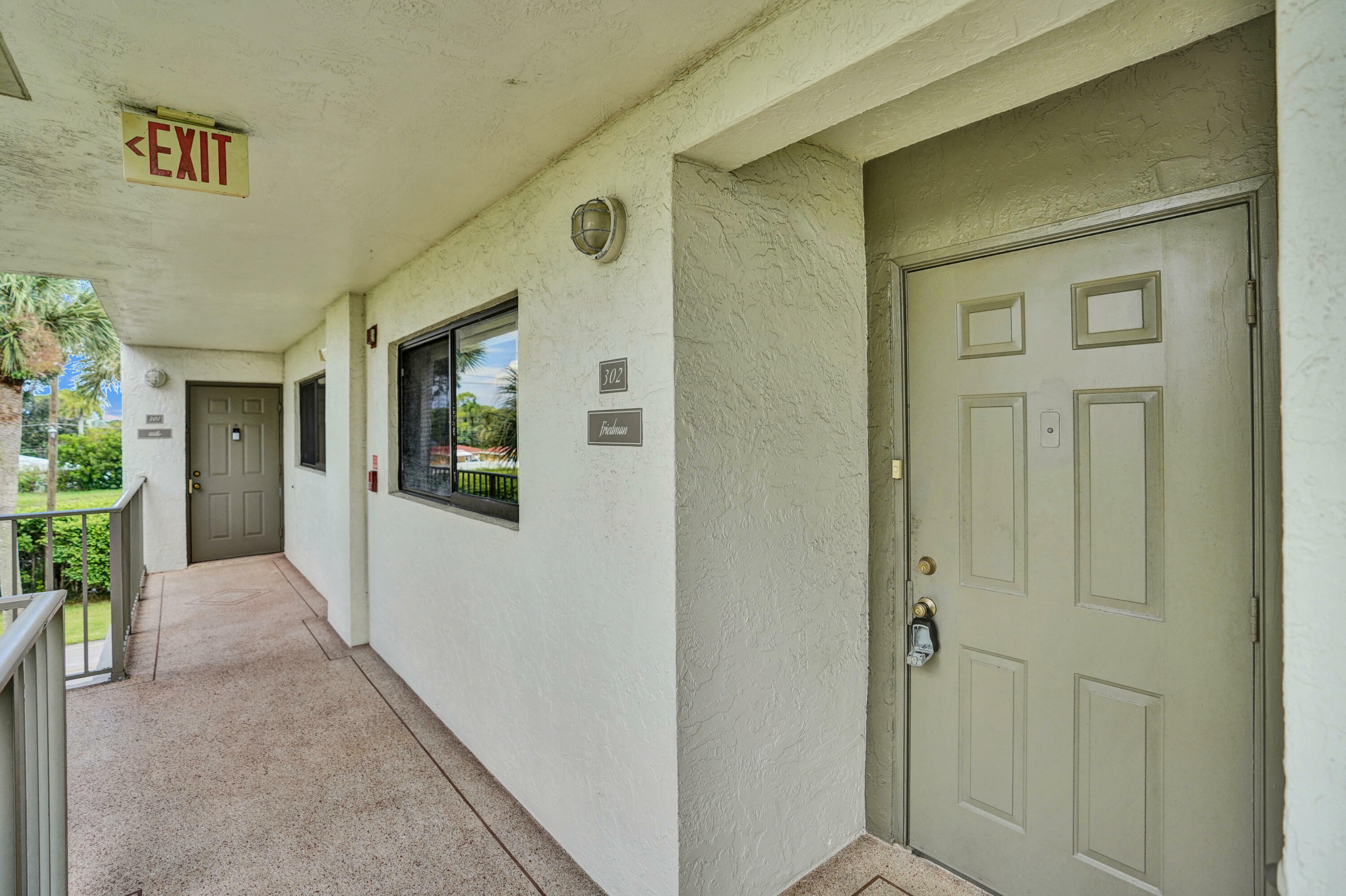 Property Photo:  5574 Witney Drive 302  FL 33484 