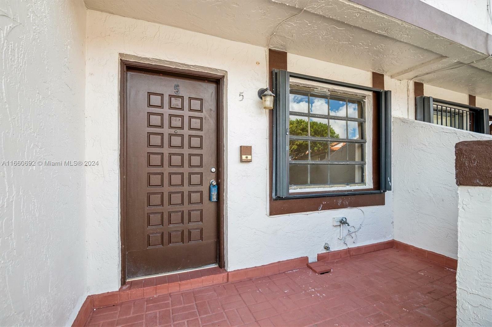 Property Photo:  13270 SW 58th Ter 9-5  FL 33183 