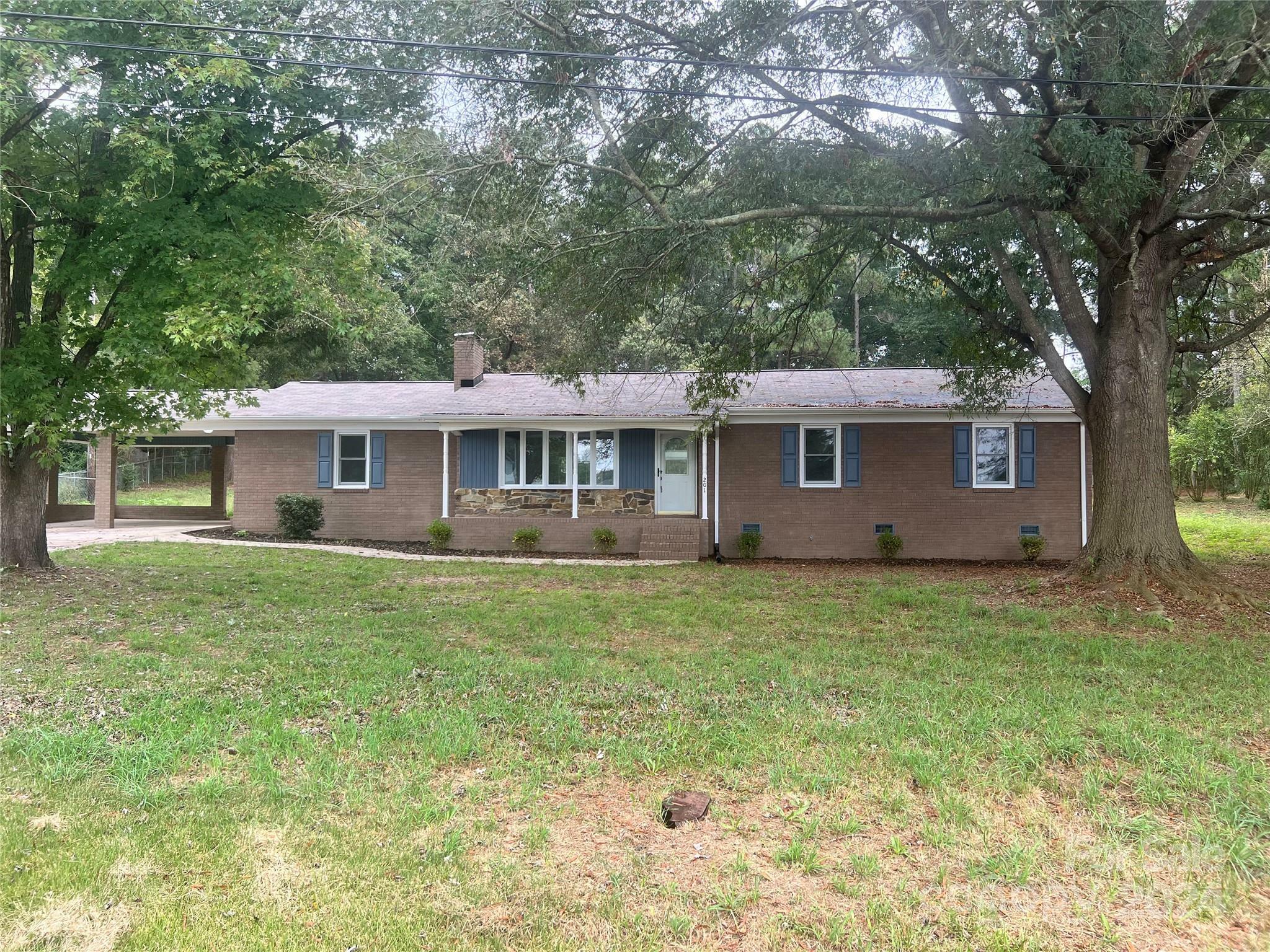 Property Photo:  201 Rocky River Road  NC 28129 