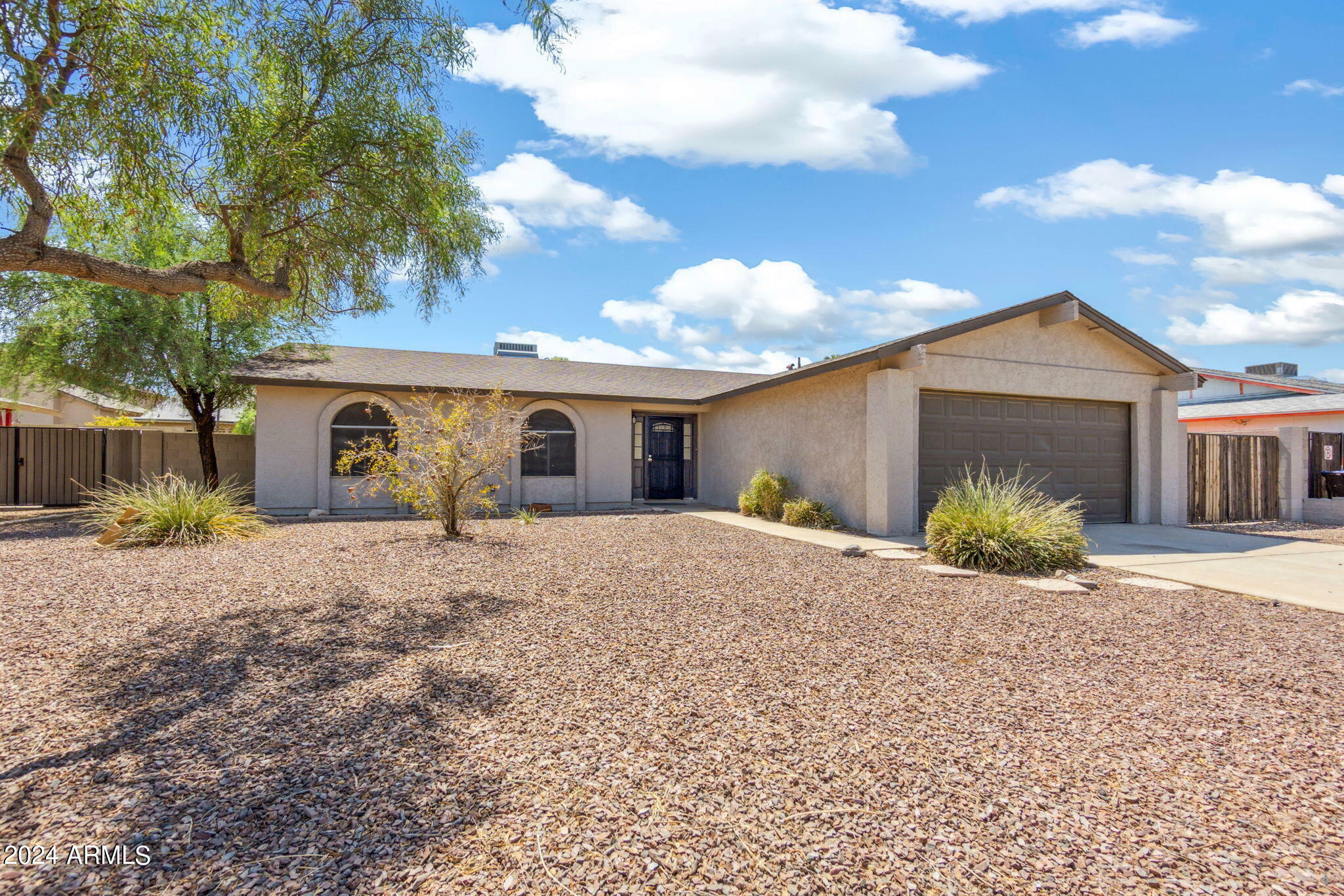 Property Photo:  7409 W Mission Lane  AZ 85345 