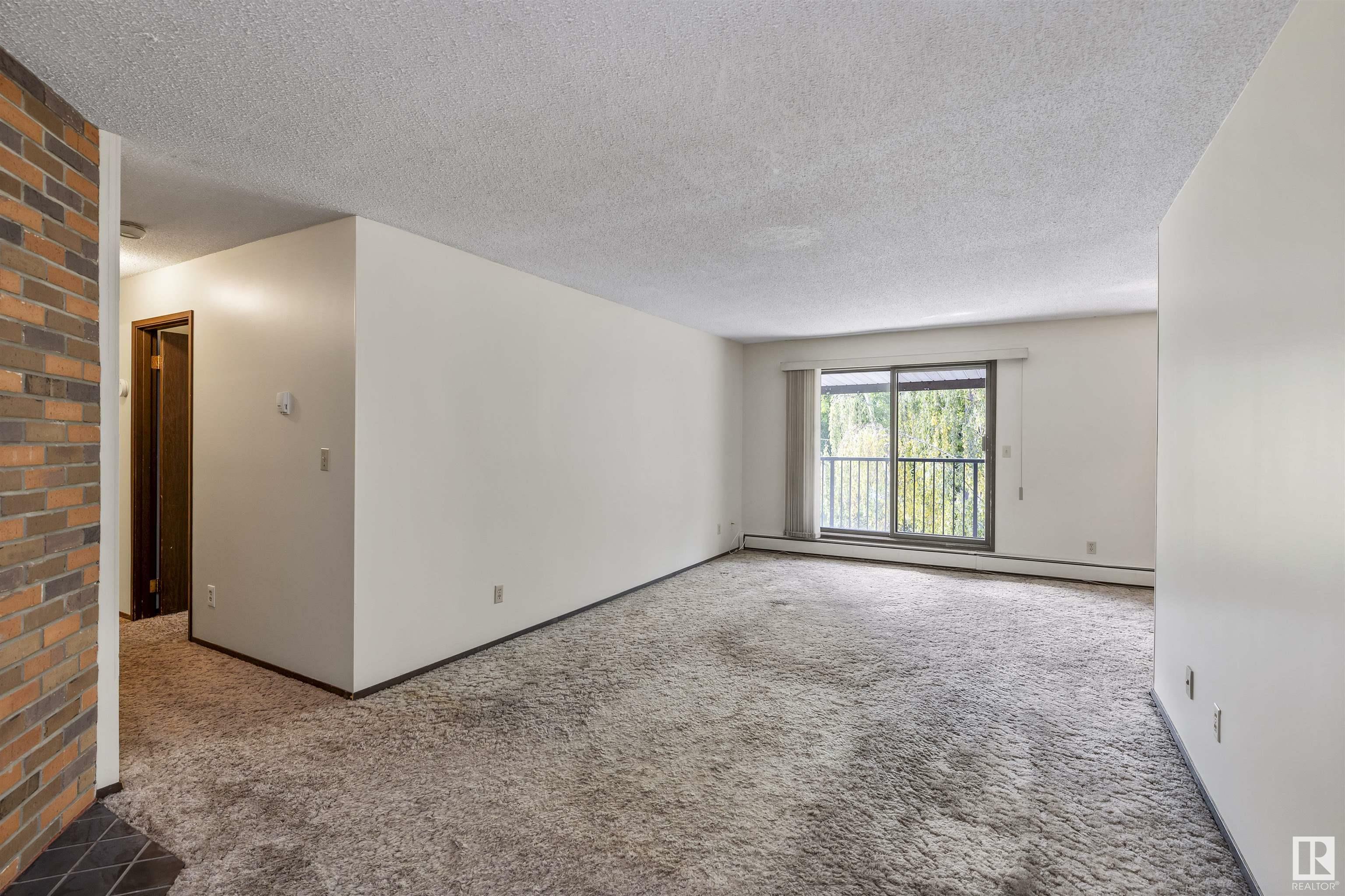 Property Photo:  10737 116 Street NW 9  AB T5H 3M3 