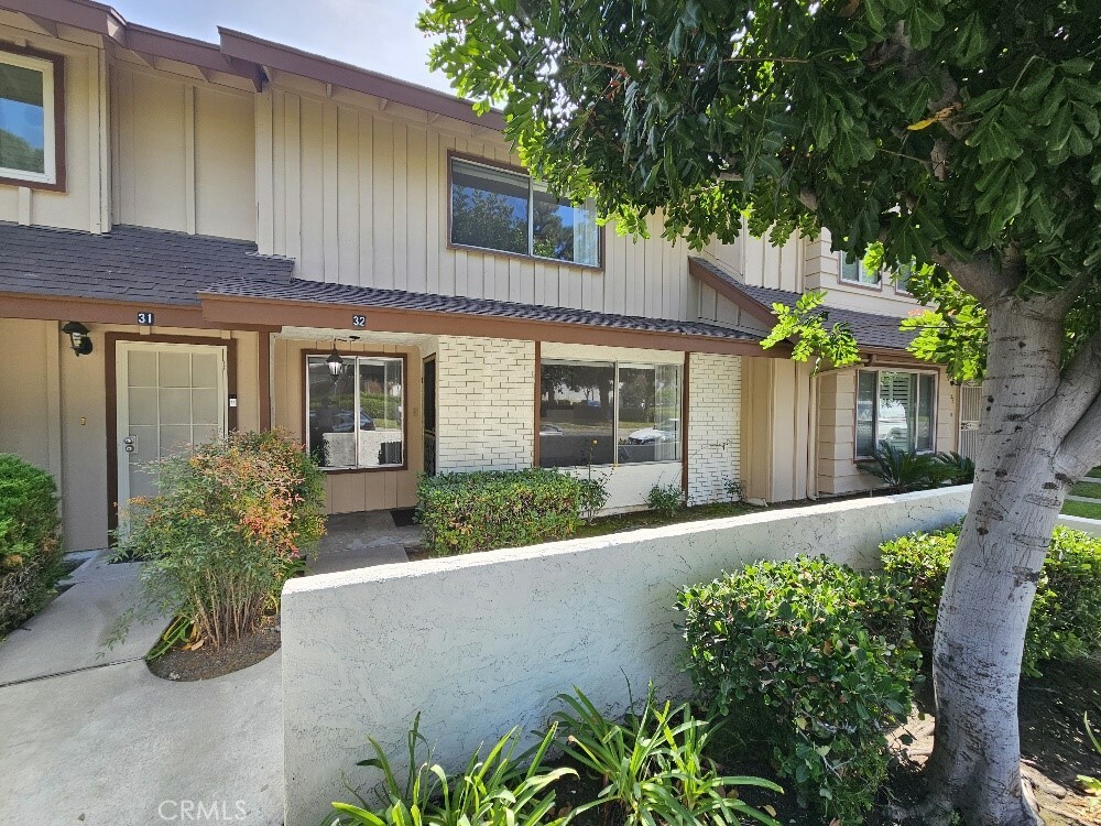 Property Photo:  11000 Woodruff Avenue 32  CA 90241 