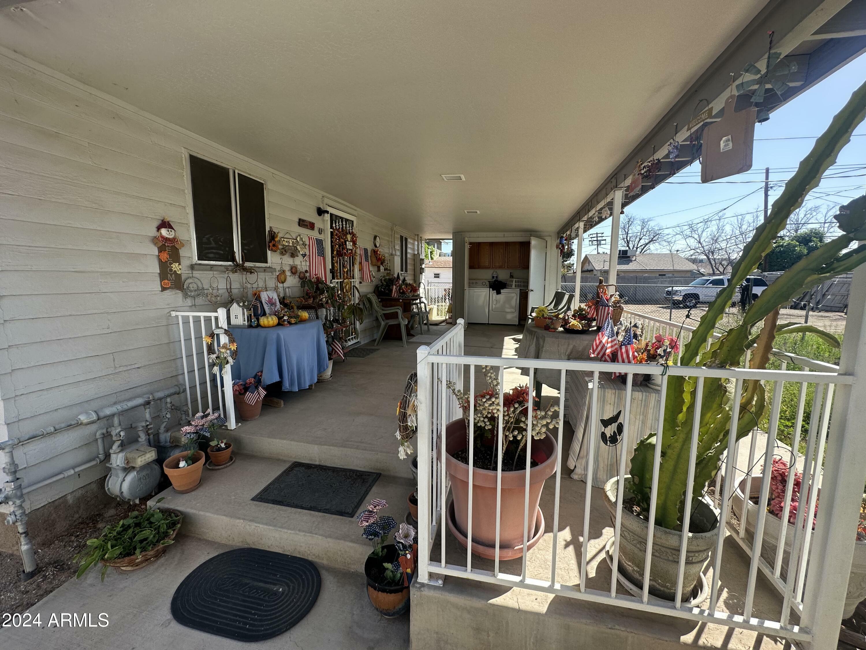 Property Photo:  8261 W Madison Street  AZ 85345 