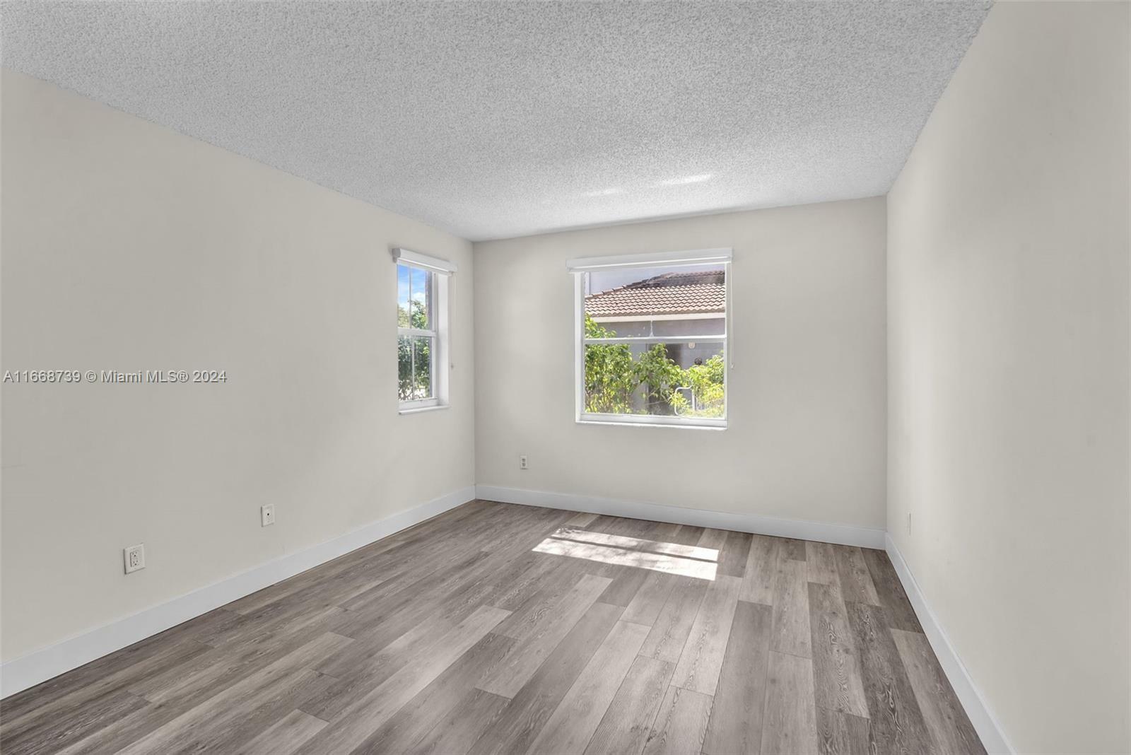 Property Photo:  9610 NW 2nd St 8-102  FL 33024 