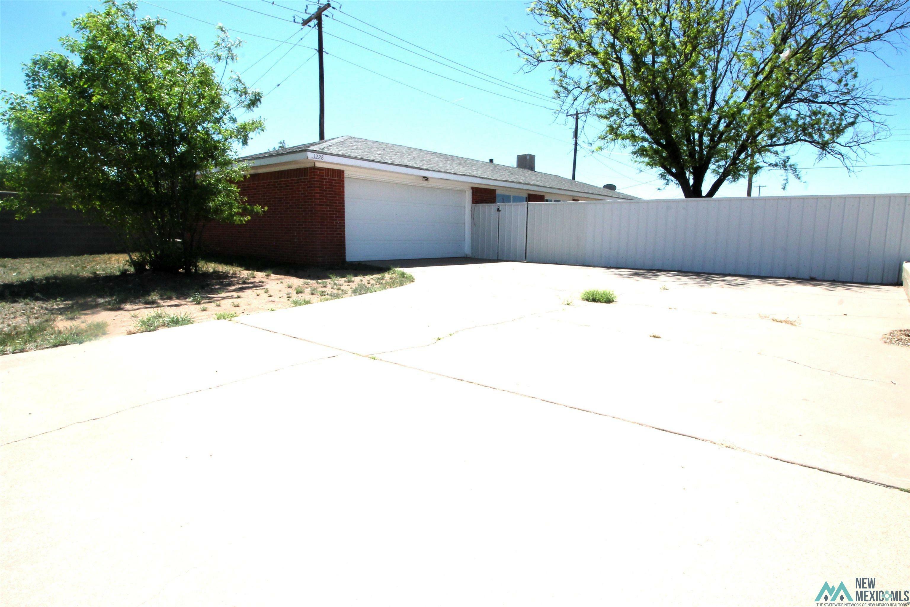 Property Photo:  1228 E 3rd Street  NM 88130 