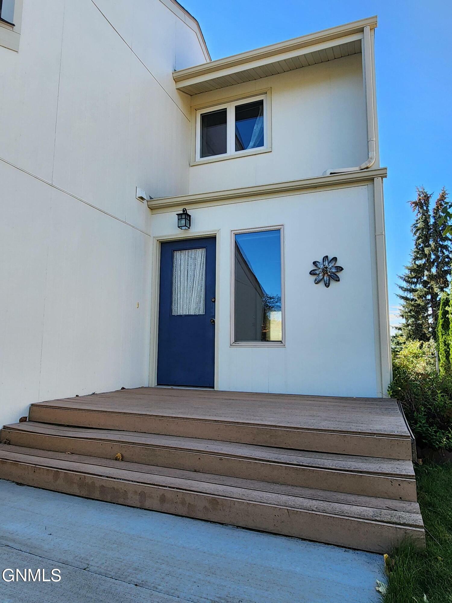 Property Photo:  411 Apollo Avenue  ND 58503 