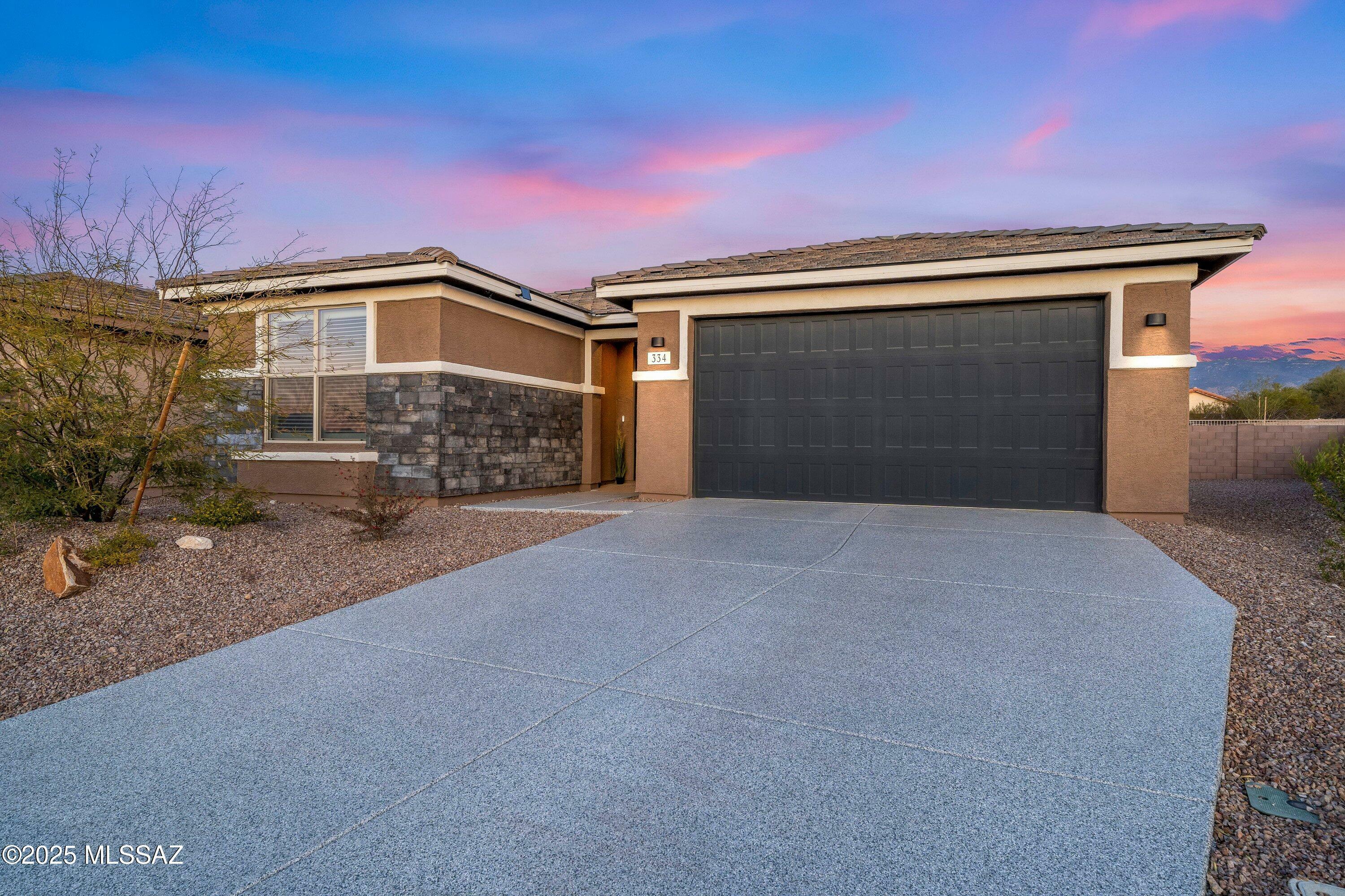 Property Photo:  334 N White Marble Avenue  AZ 85748 