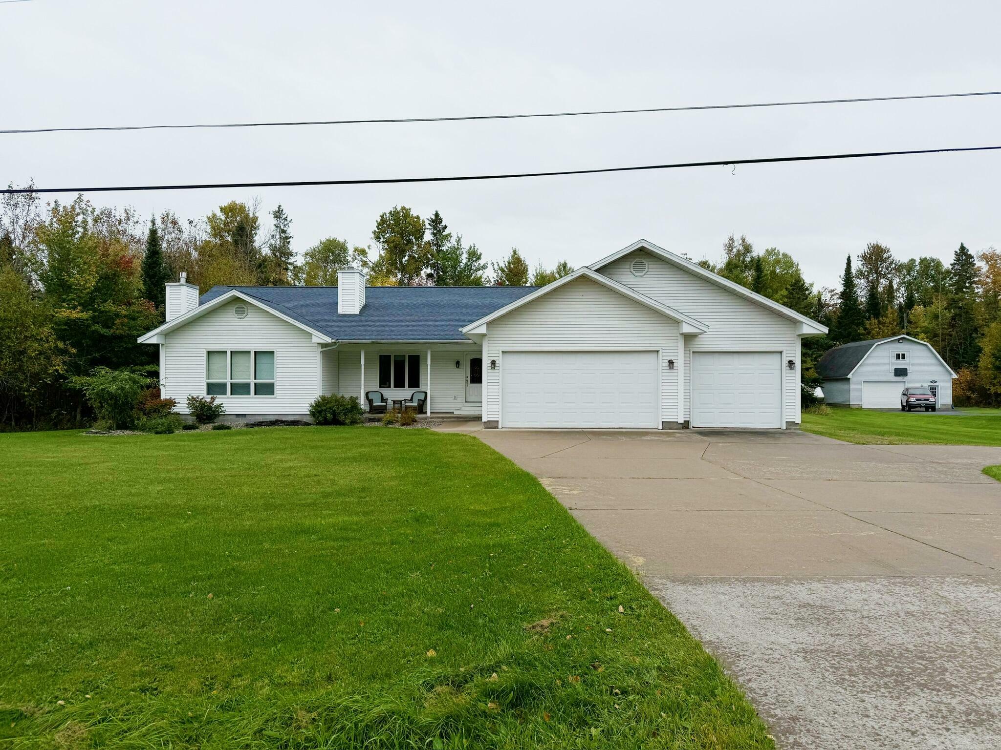 Property Photo:  3216 S Sun Glo Dr  MI 49783 