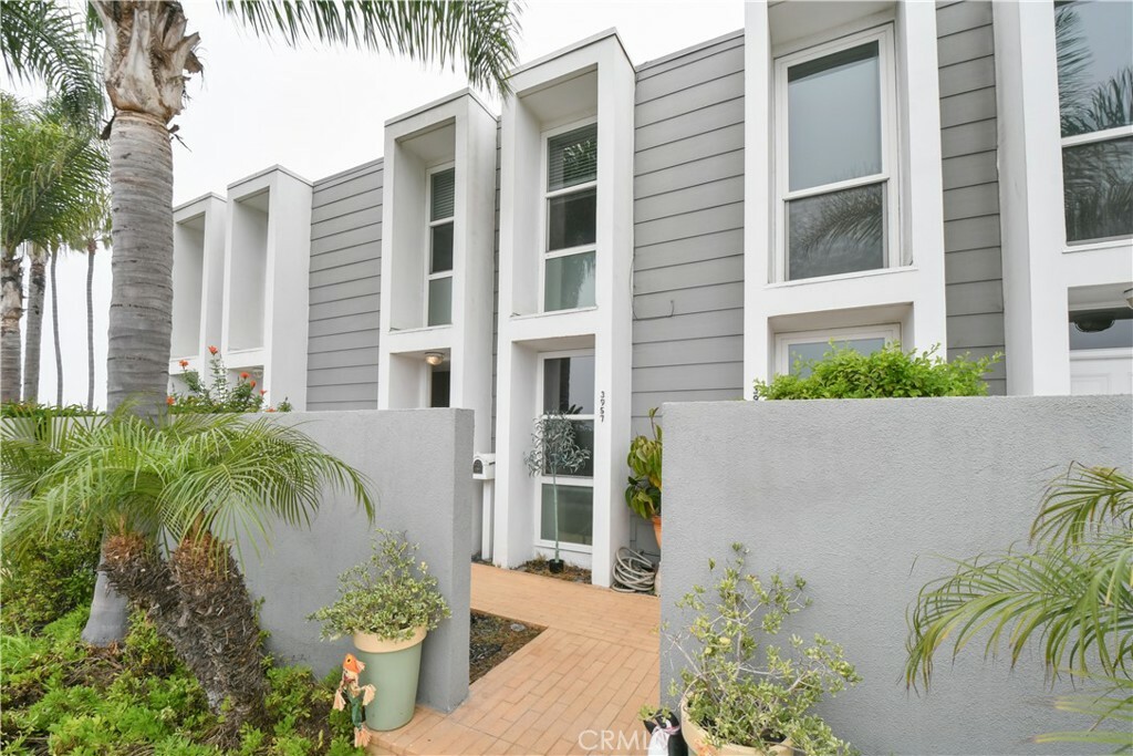 Property Photo:  3957 Warner Avenue  CA 92649 