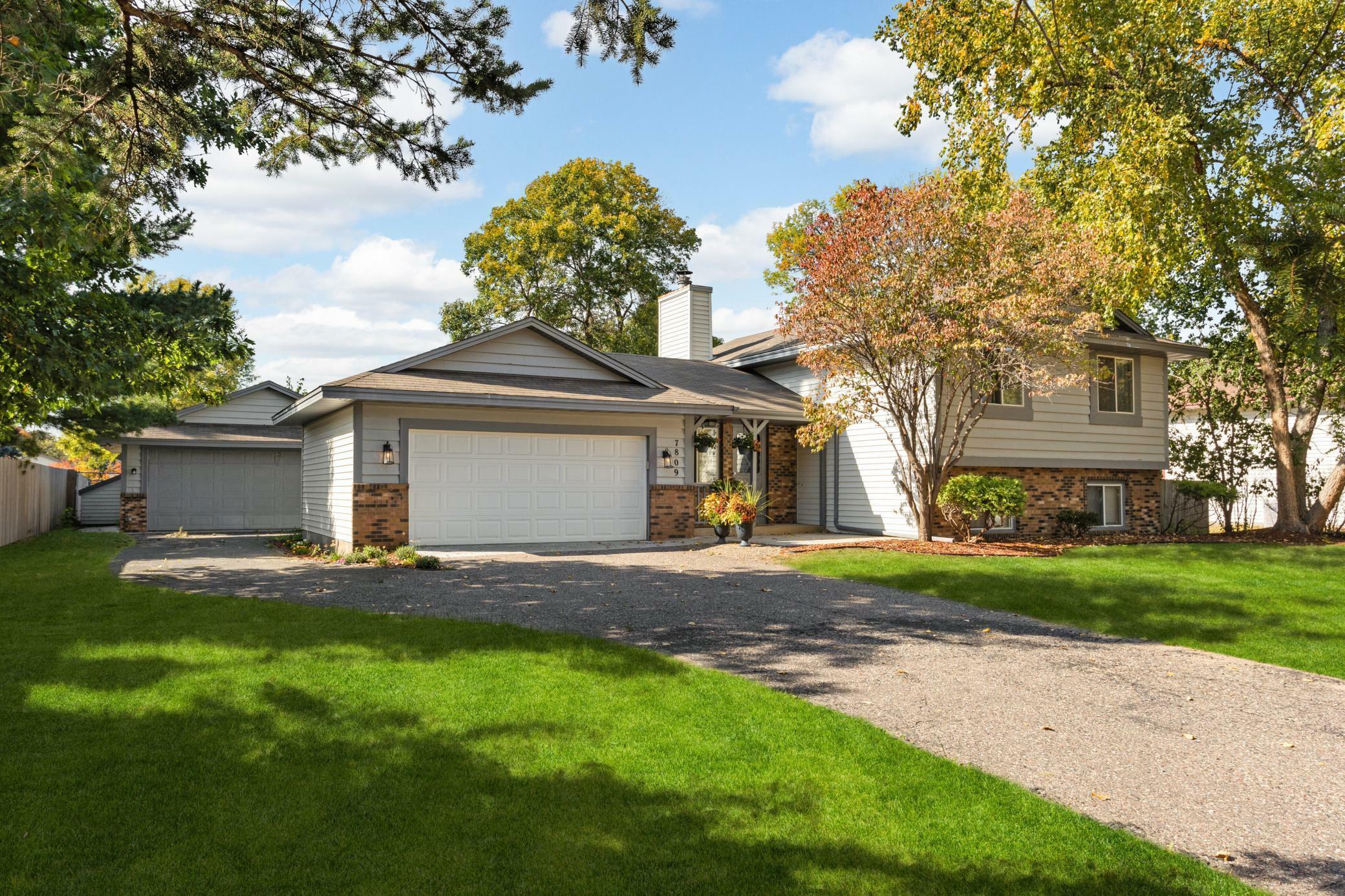 Property Photo:  7809 Emerson Avenue N  MN 55444 