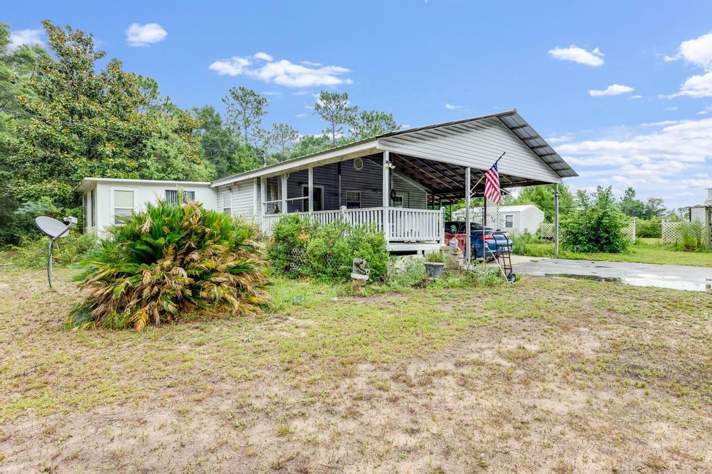 Property Photo:  5195 Galliver Cut Off  FL 32531 