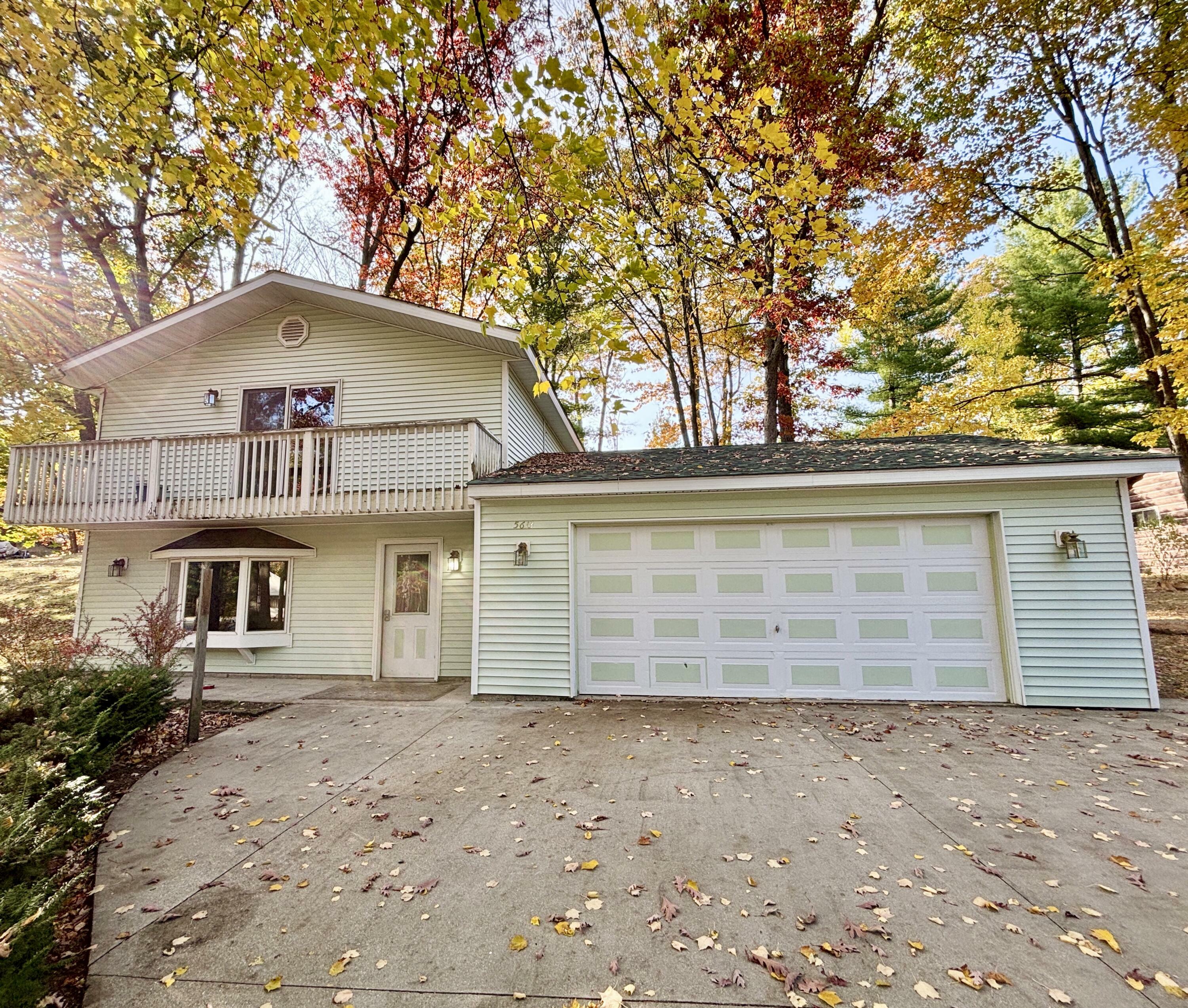 Property Photo:  5613 N Red Oak Road  MI 49756 