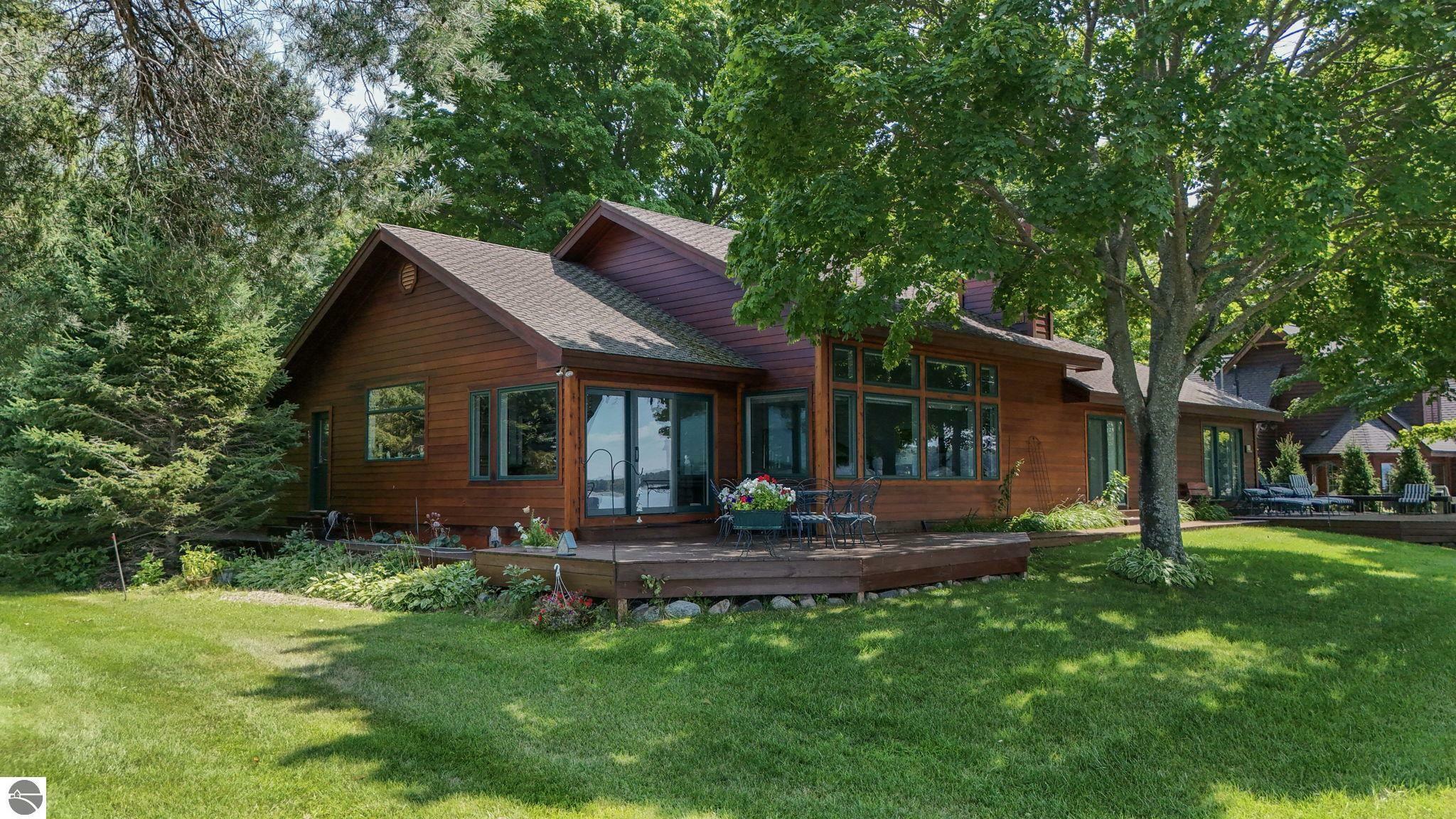 Property Photo:  11492 SE Torch Lake Drive  MI 49612 