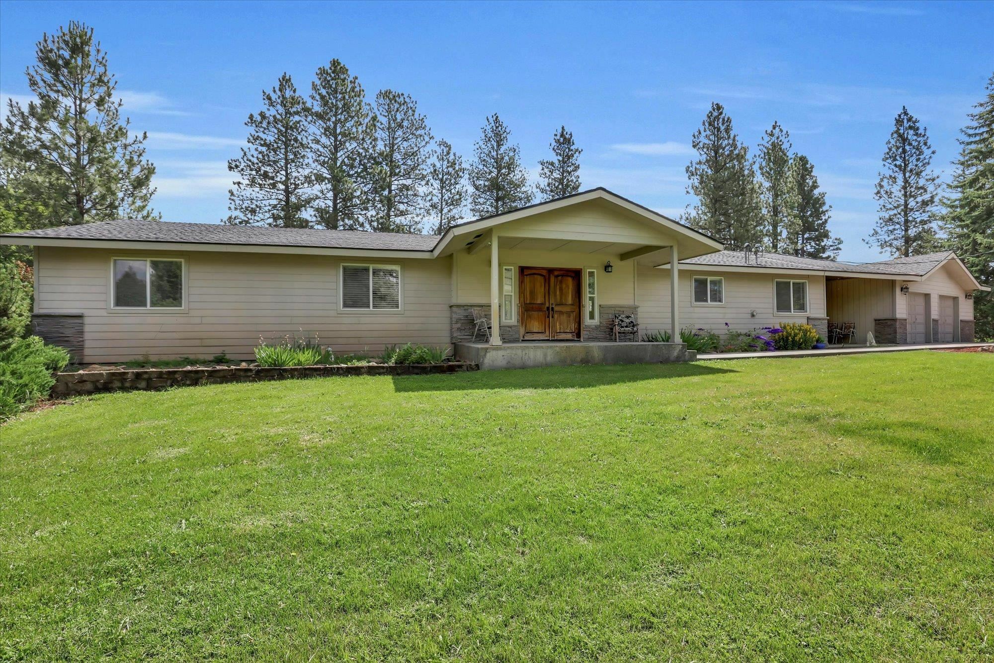 Property Photo:  10715 S Freya Rd  WA 99223 