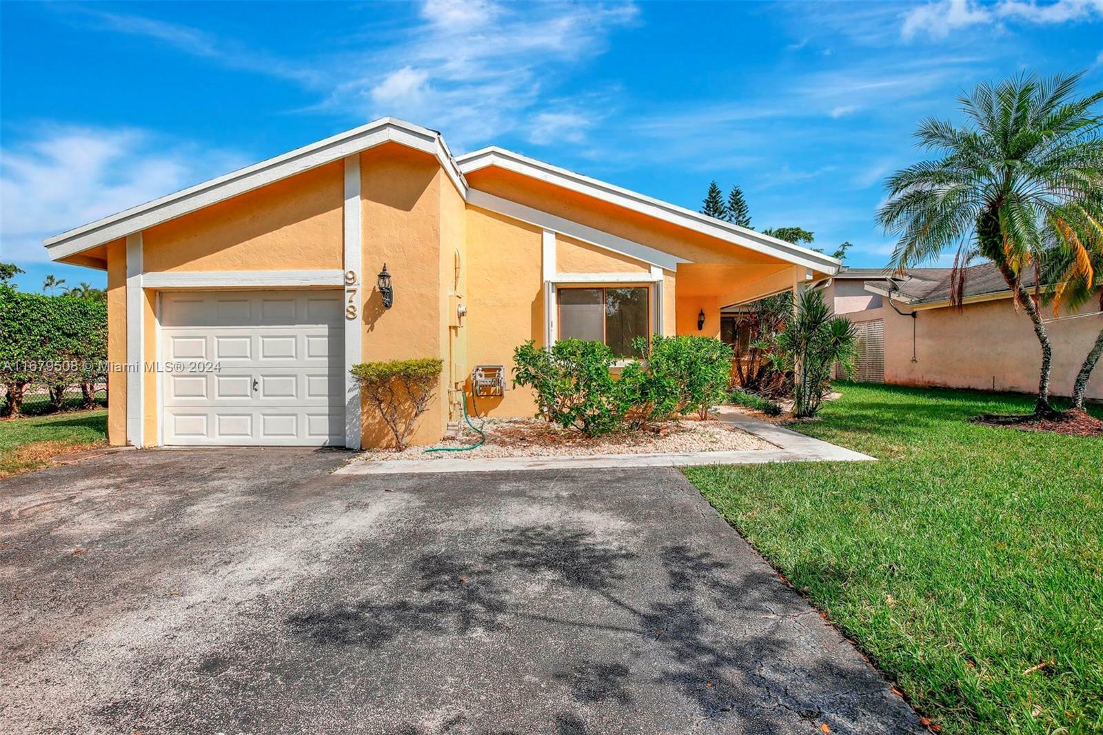 Property Photo:  978 NW 89th Ave  FL 33324 