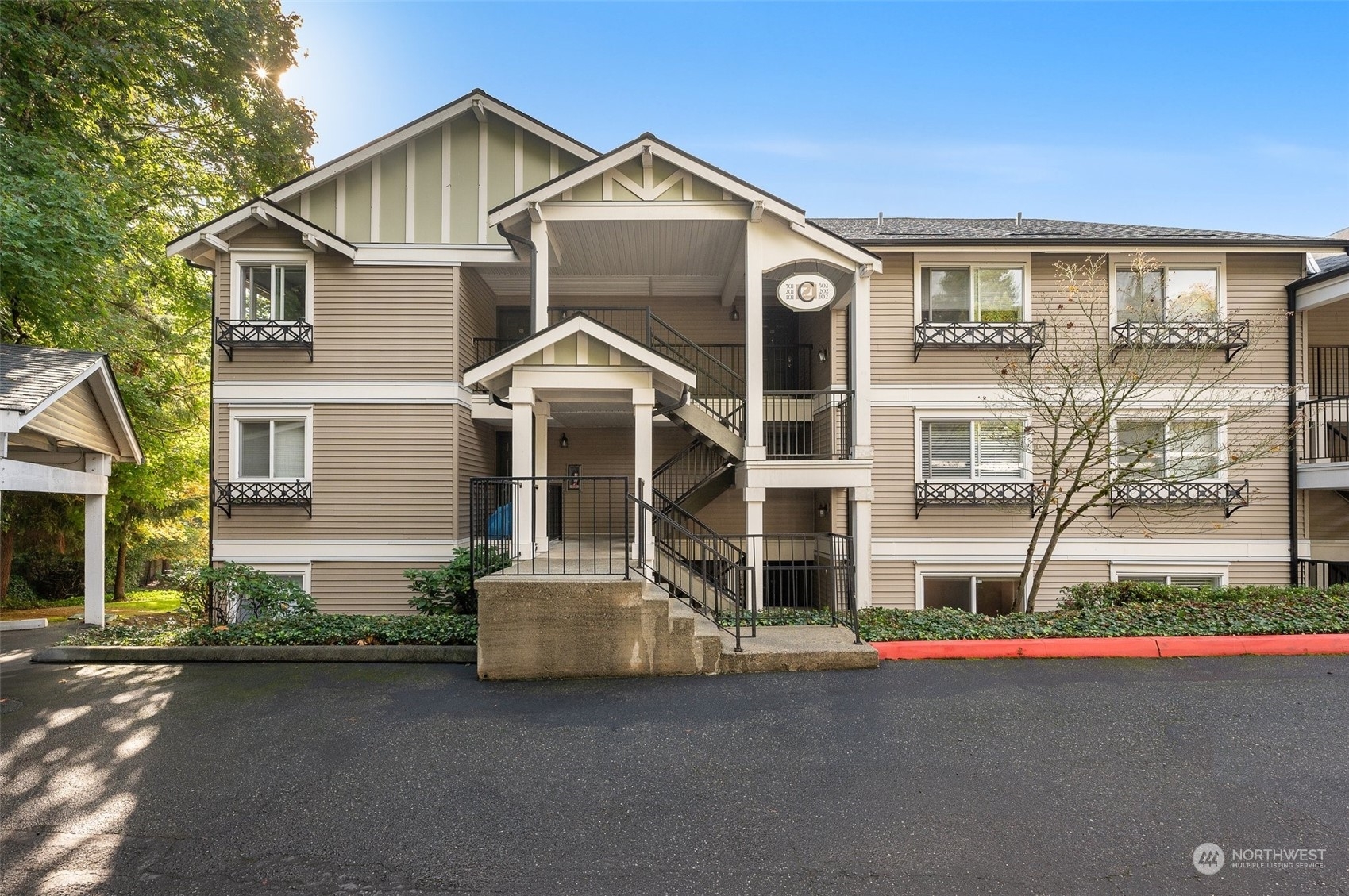 Property Photo:  11305 NE 128th Street C102  WA 98034 