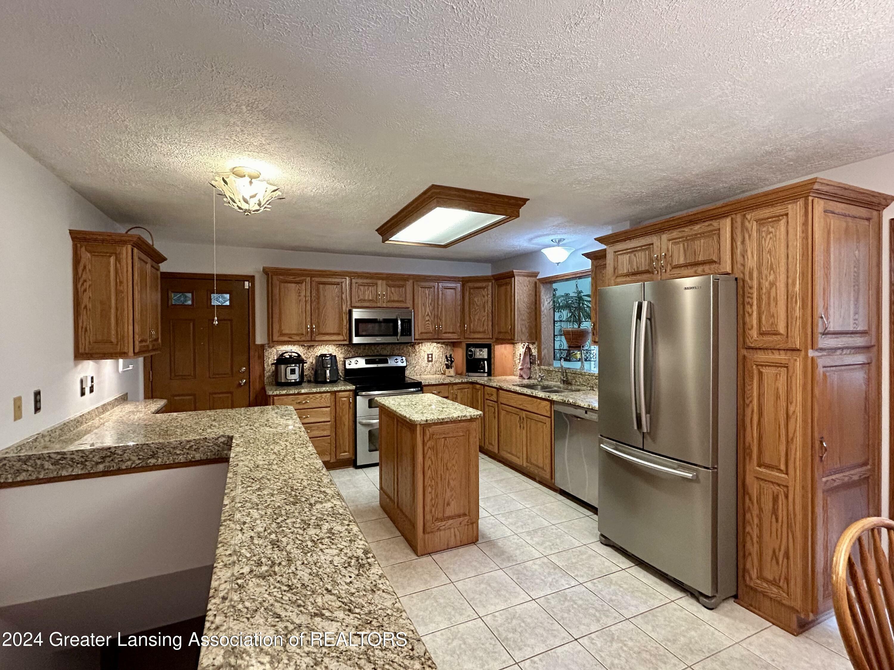 Property Photo:  2188 Candlewood Drive  MI 48813 