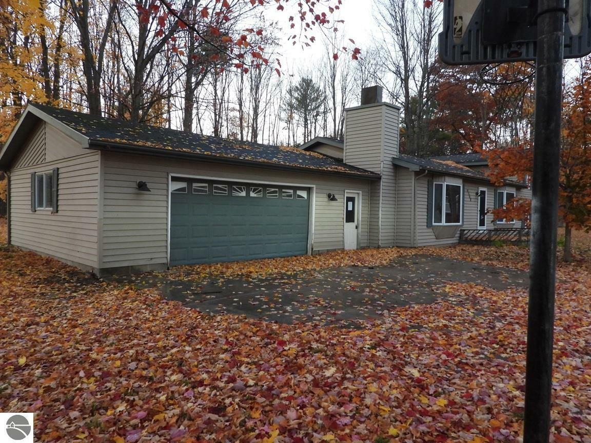 Property Photo:  4560 W Otsego Lake Drive  MI 49735 