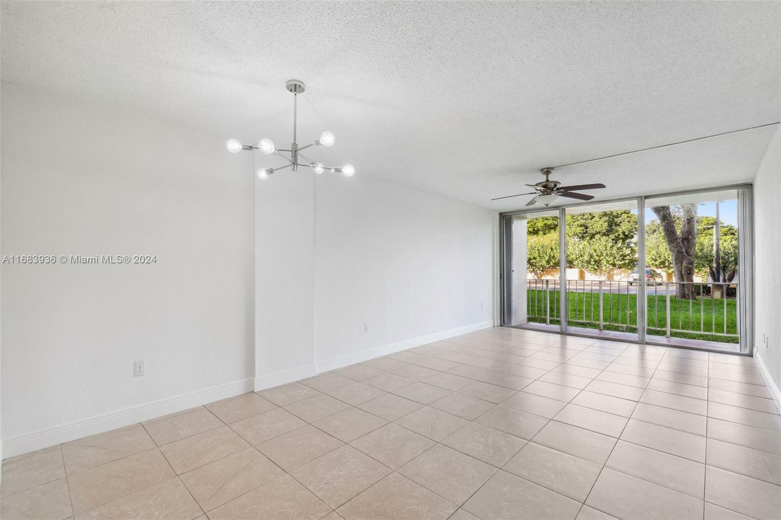 Property Photo:  13120 SW 92nd Ave B-103  FL 33176 