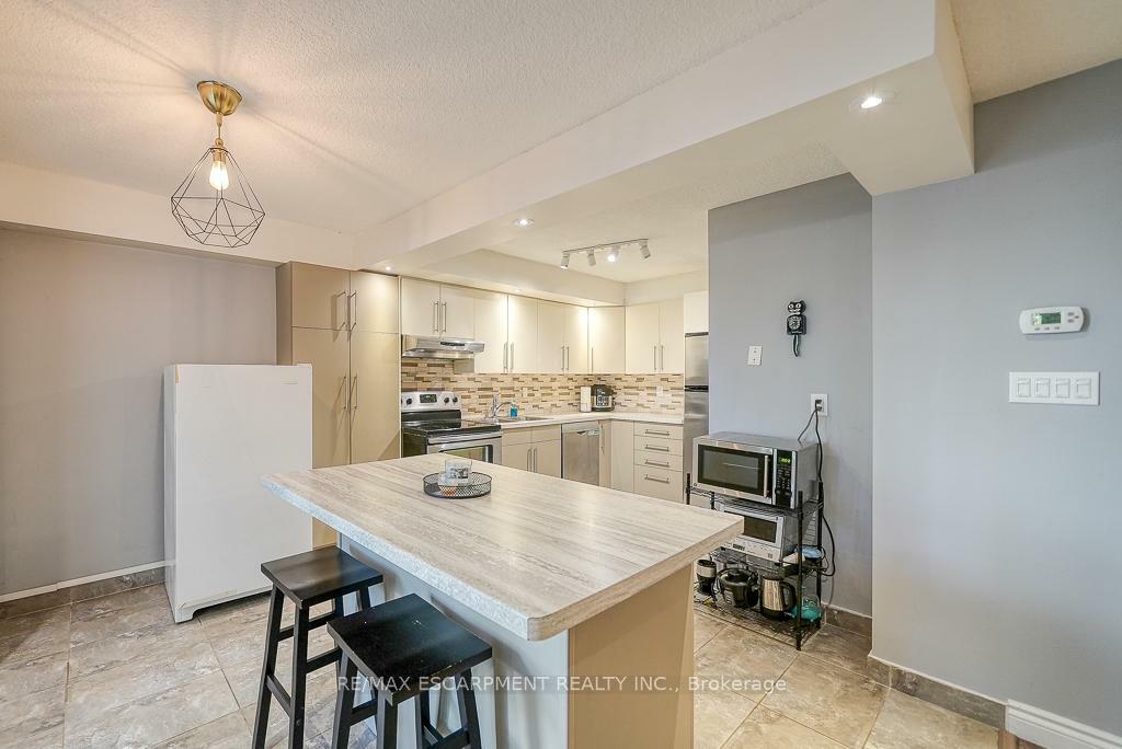 Property Photo: 1300 Marlborough Court 119 ON L6H 2S2