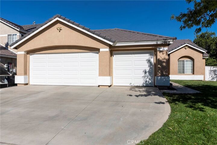 Property Photo:  12969 Bullet Avenue  CA 92392 