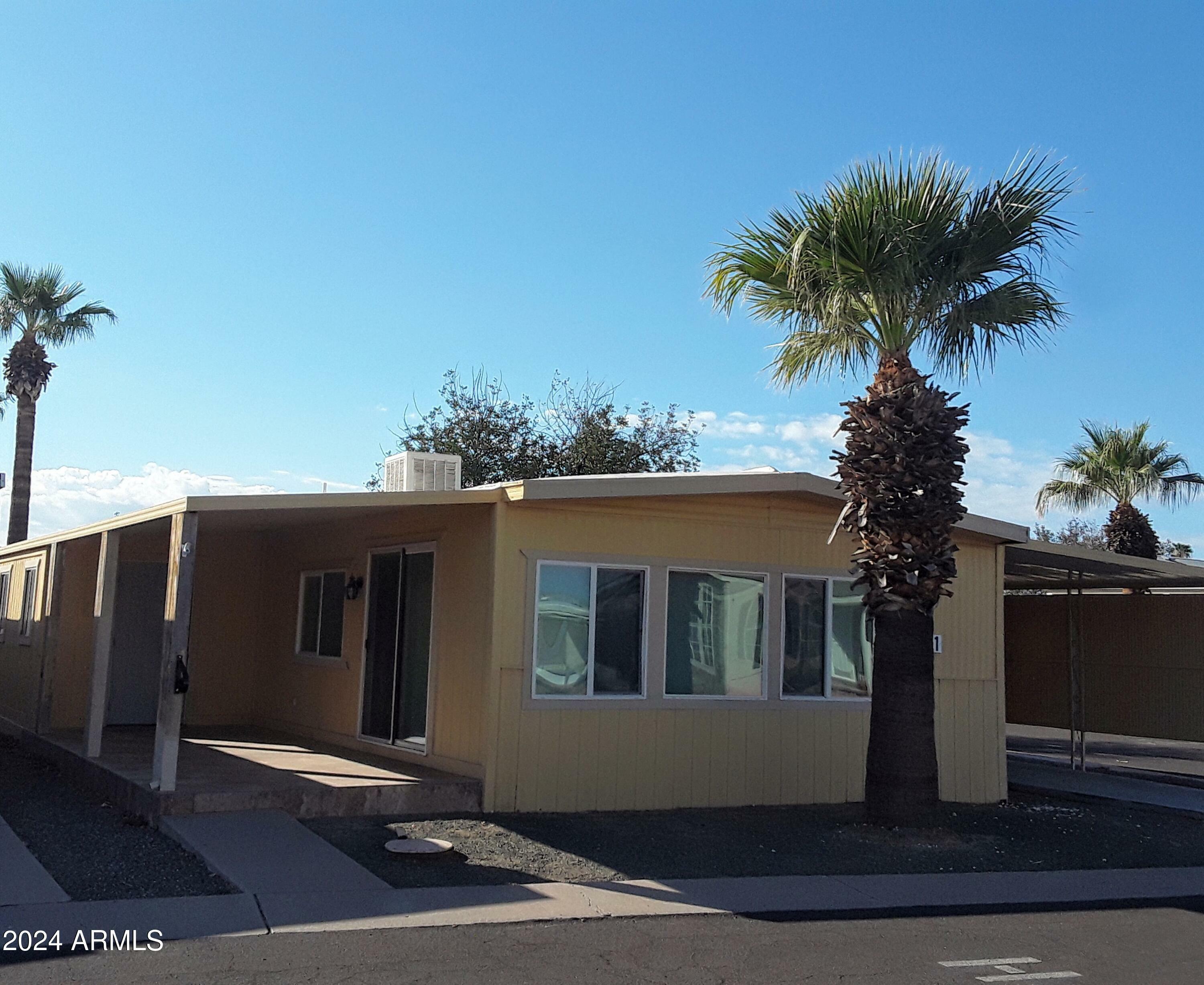 Property Photo:  10701 N 99th Avenue 101  AZ 85345 