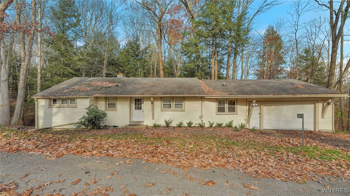 Property Photo:  7344 Park Drive  NY 14744 