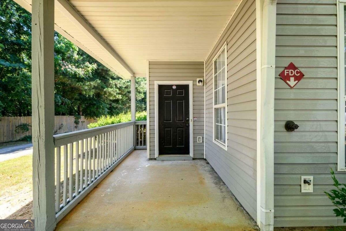 Property Photo:  215 Odyssey Turn  GA 30012 