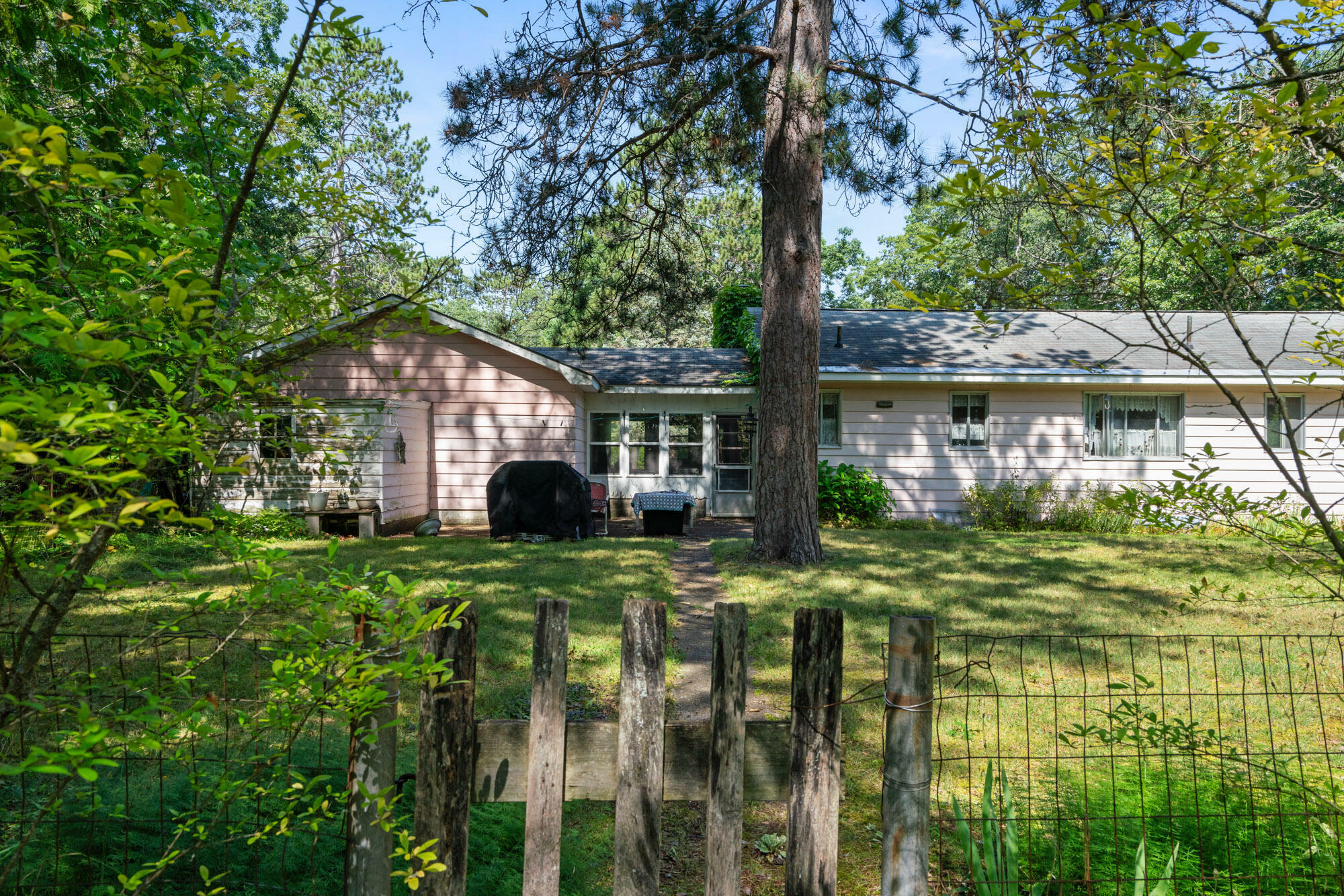 Property Photo:  6853 Fisher Woods Road  MI 49749 