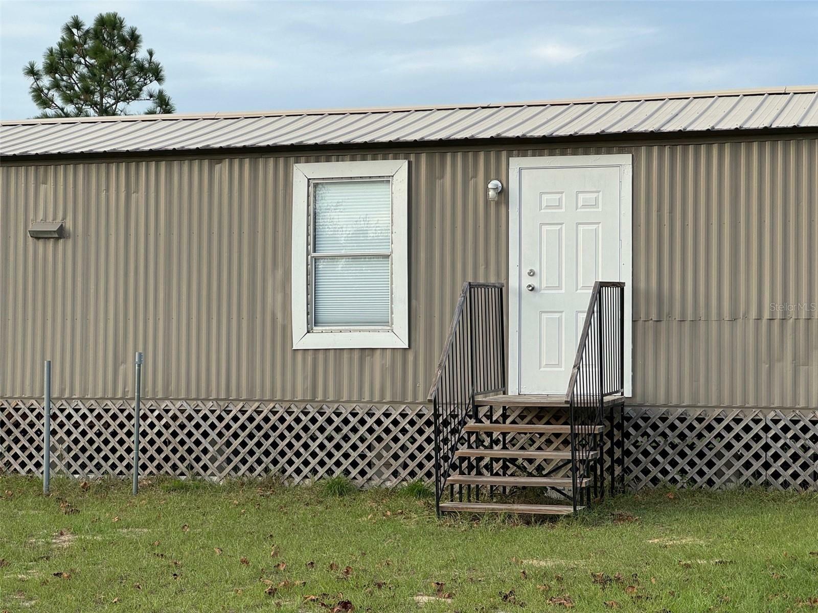 Property Photo:  12571 NE 14th Street  FL 32696 