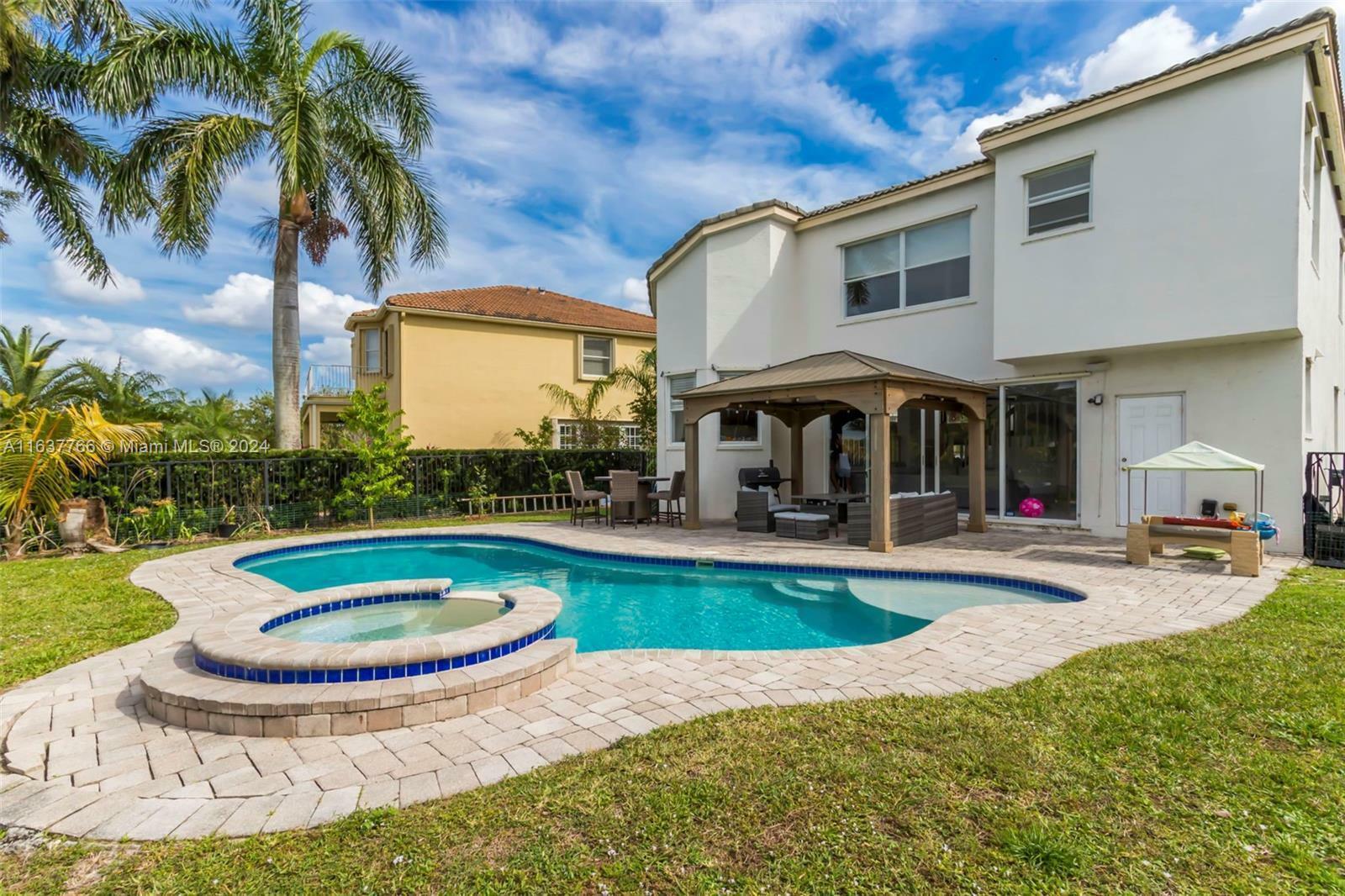 Property Photo: 9851 Woolworth Court FL 33414