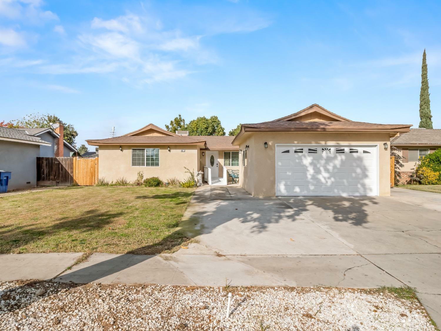 Property Photo:  4871 E Norwich Avenue  CA 93726 