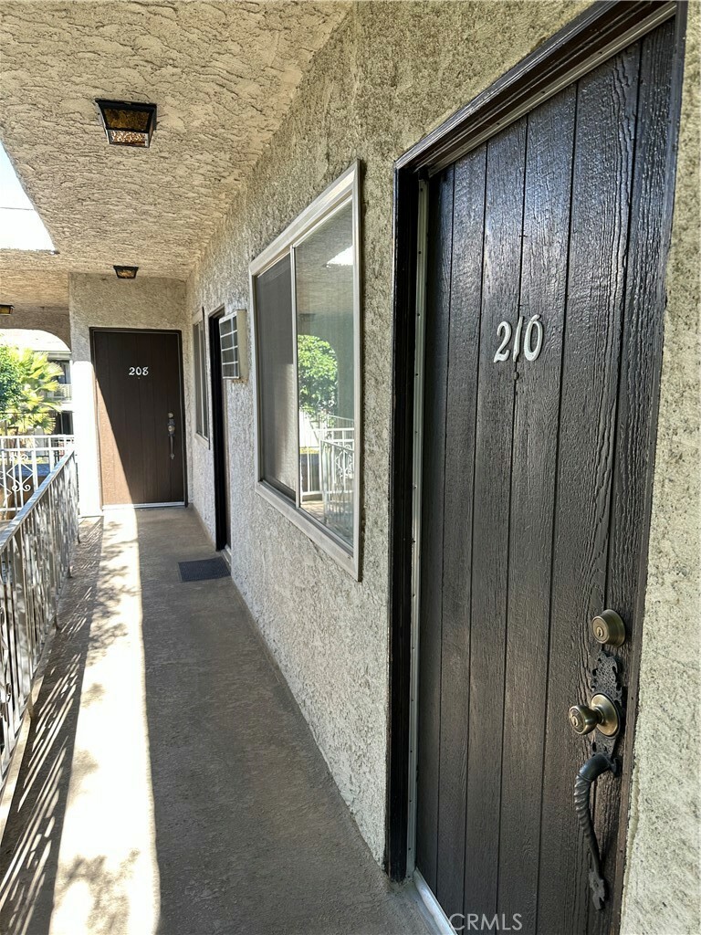 Property Photo:  7055 Etiwanda Avenue 210  CA 91335 