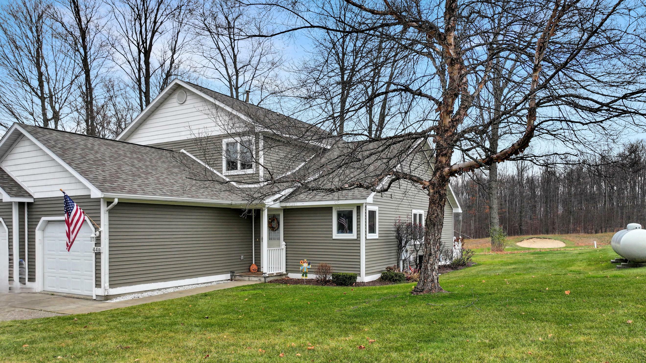 Property Photo:  4974 Tee Lane  MI 49735 