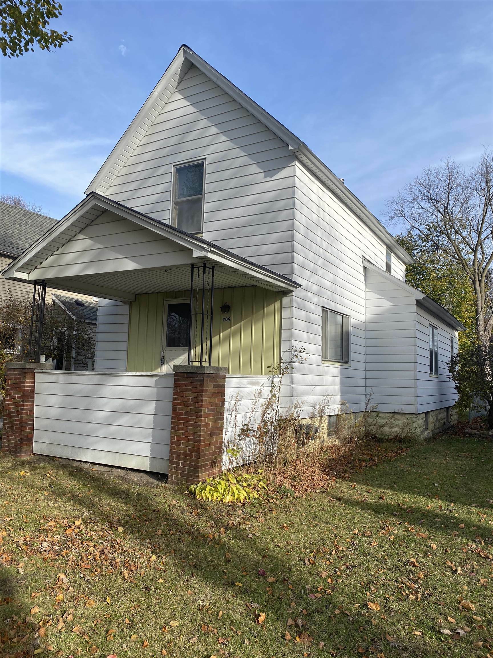 Property Photo:  209 Raymond Street  MI 48706 