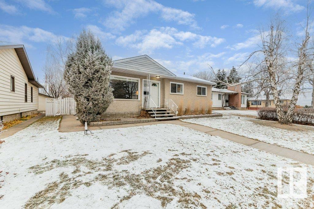 Property Photo:  10916 139 Street NW  AB T5M 1P9 