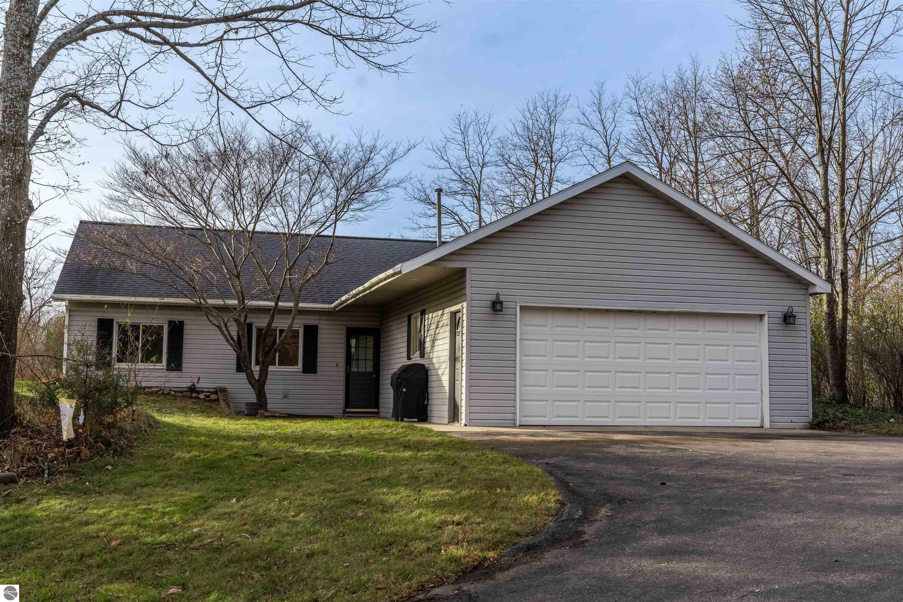 Property Photo:  3801 Leeside Lane  MI 49686 